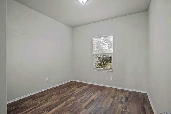 a kitchen with stainless steel appliances a refrigerator and a stove top oven