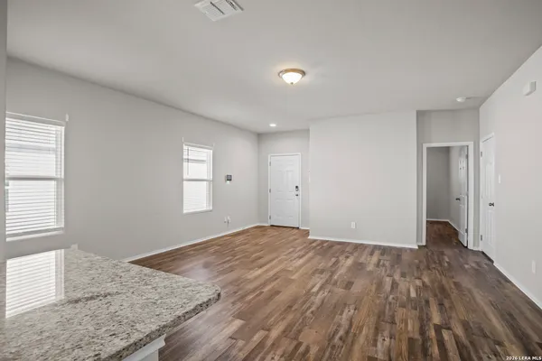 a view of an empty room and window