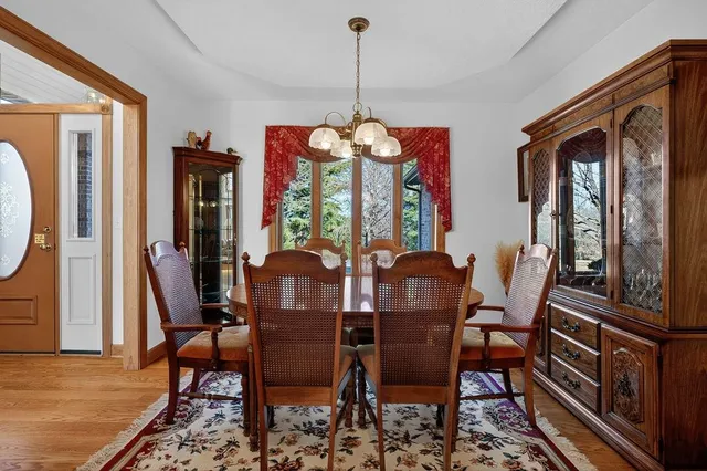 a kitchen with a refrigerator a microwave a sink and a stove