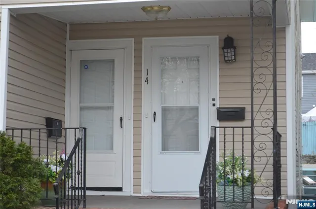 a view of bathroom with sink and mirror