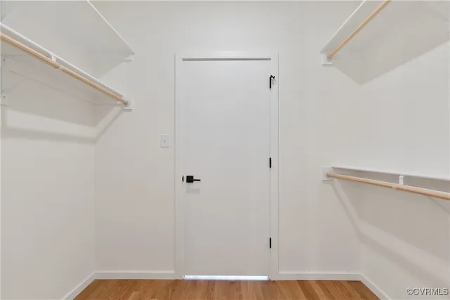 a view of an empty walk in closet