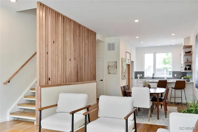a view of a livingroom with furniture and window