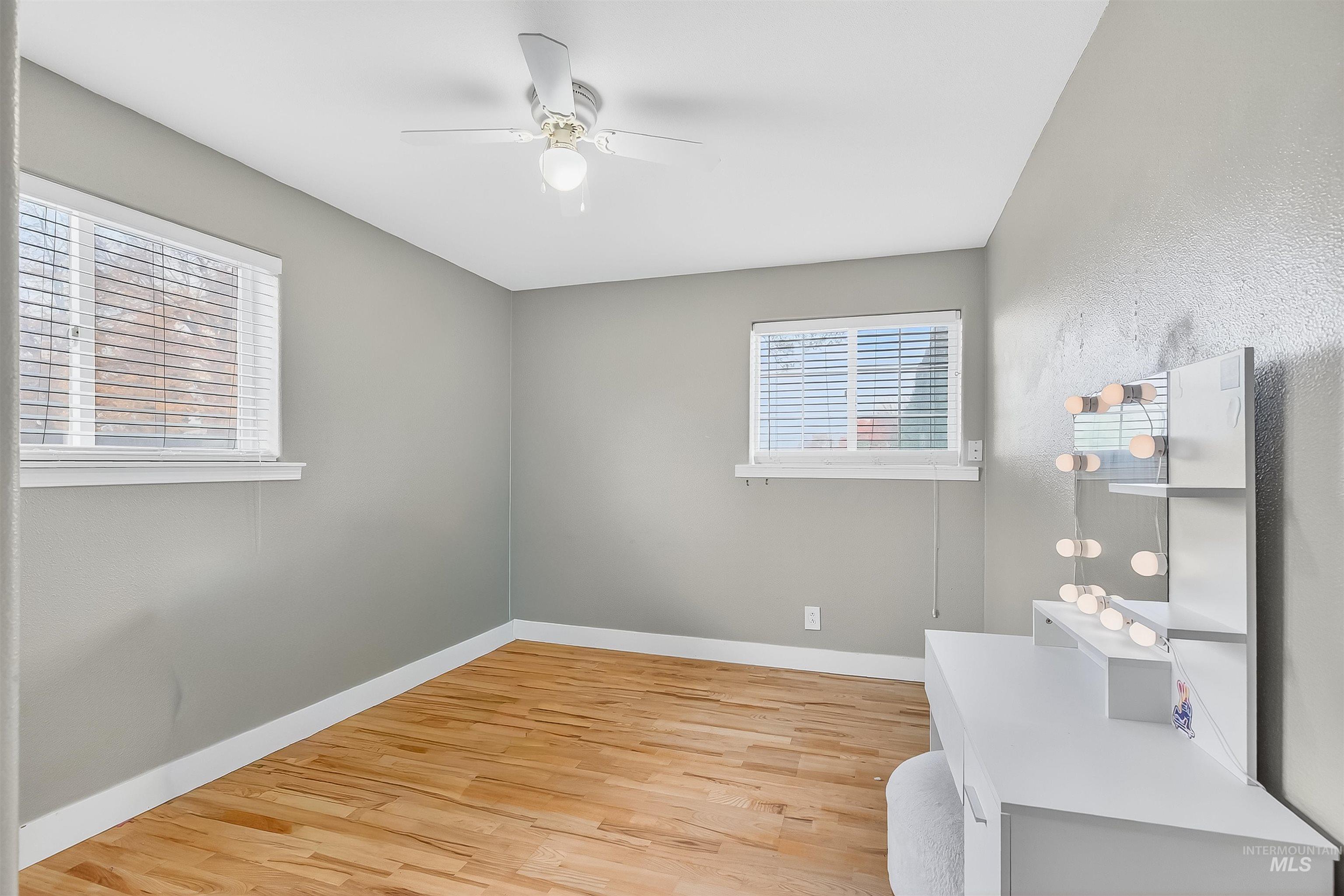 1220 Birch Avenue Lewiston, ID 83501 - Photo 34 of 45 Unfurnished bedroom featuring light wood-style flooring and a ceiling fan