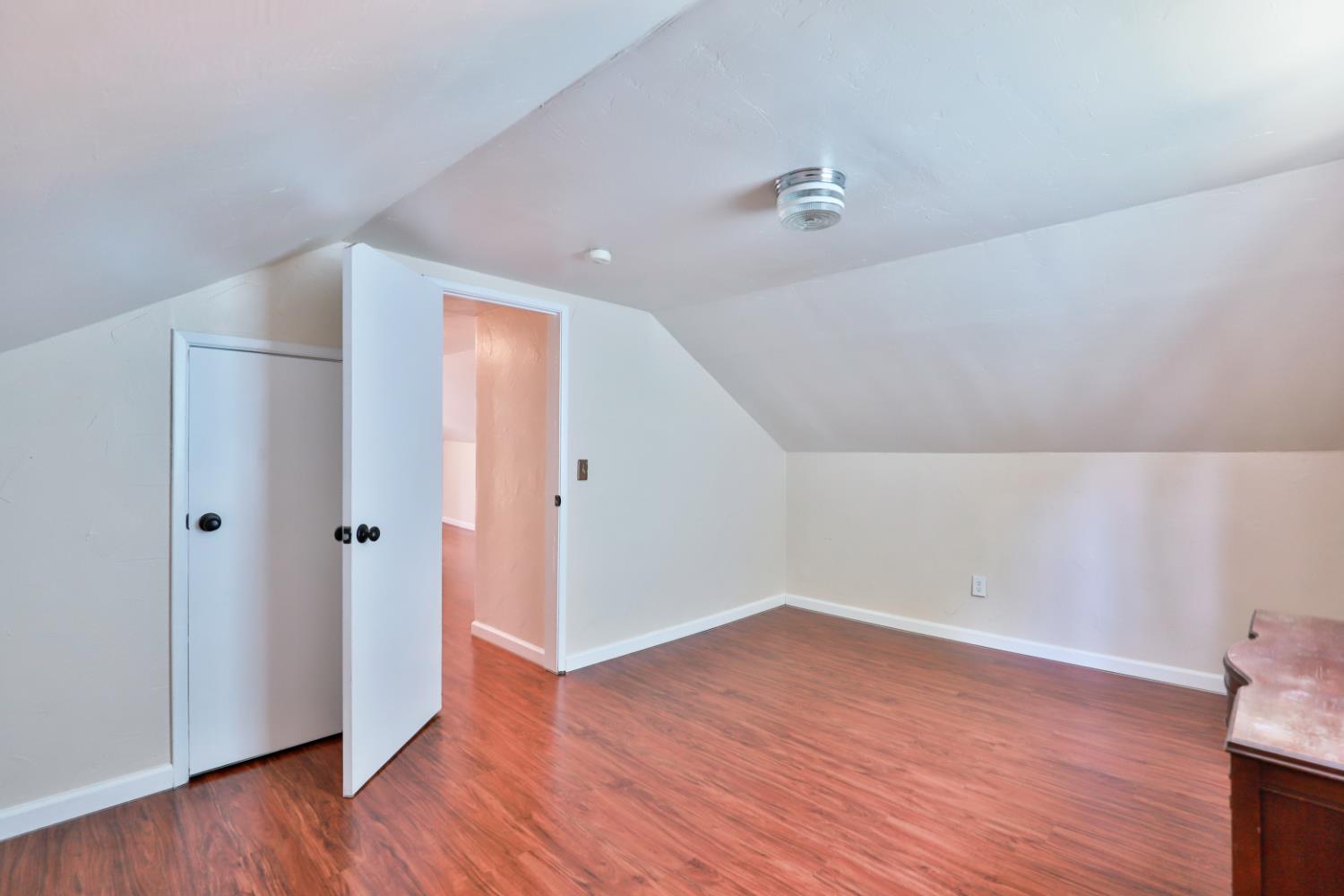 207 Peek Street Jackson, CA 95642 - Photo 18 of 30 a view of a room with wooden floor