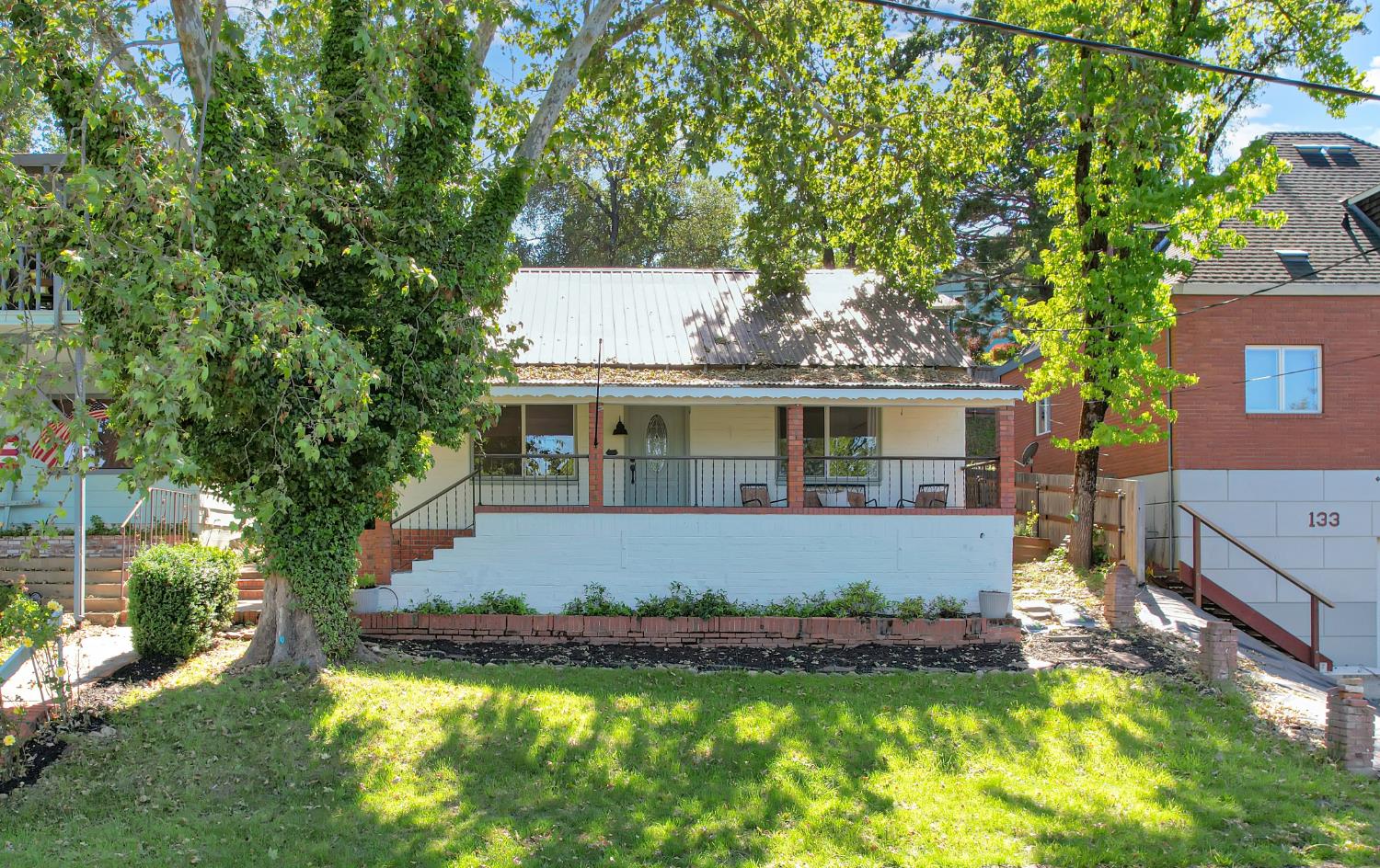 207 Peek Street Jackson, CA 95642 - Photo 2 of 30 a view of a house with a swimming pool