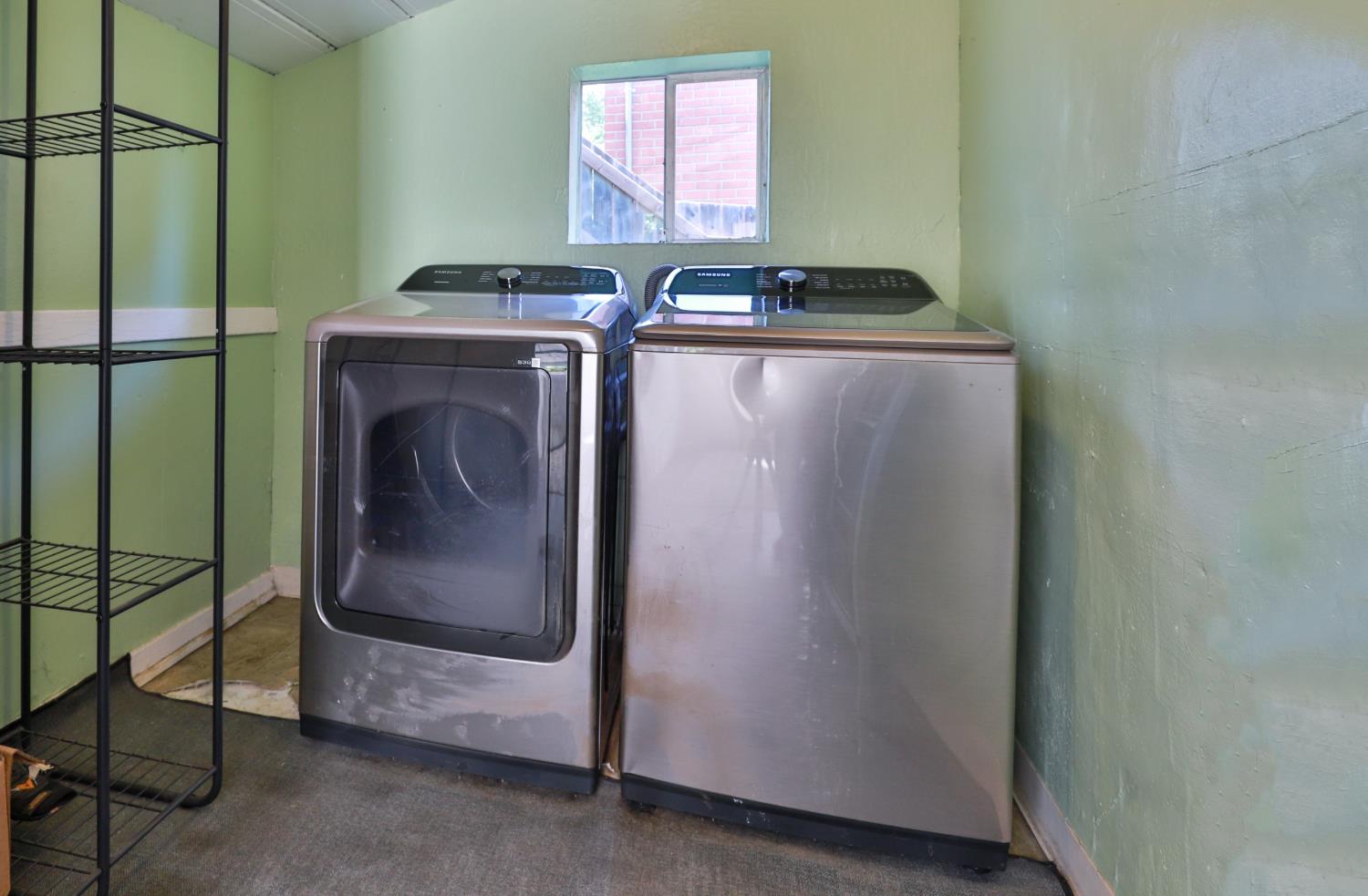 207 Peek Street Jackson, CA 95642 - Photo 24 of 30 a utility room with dryer and washer