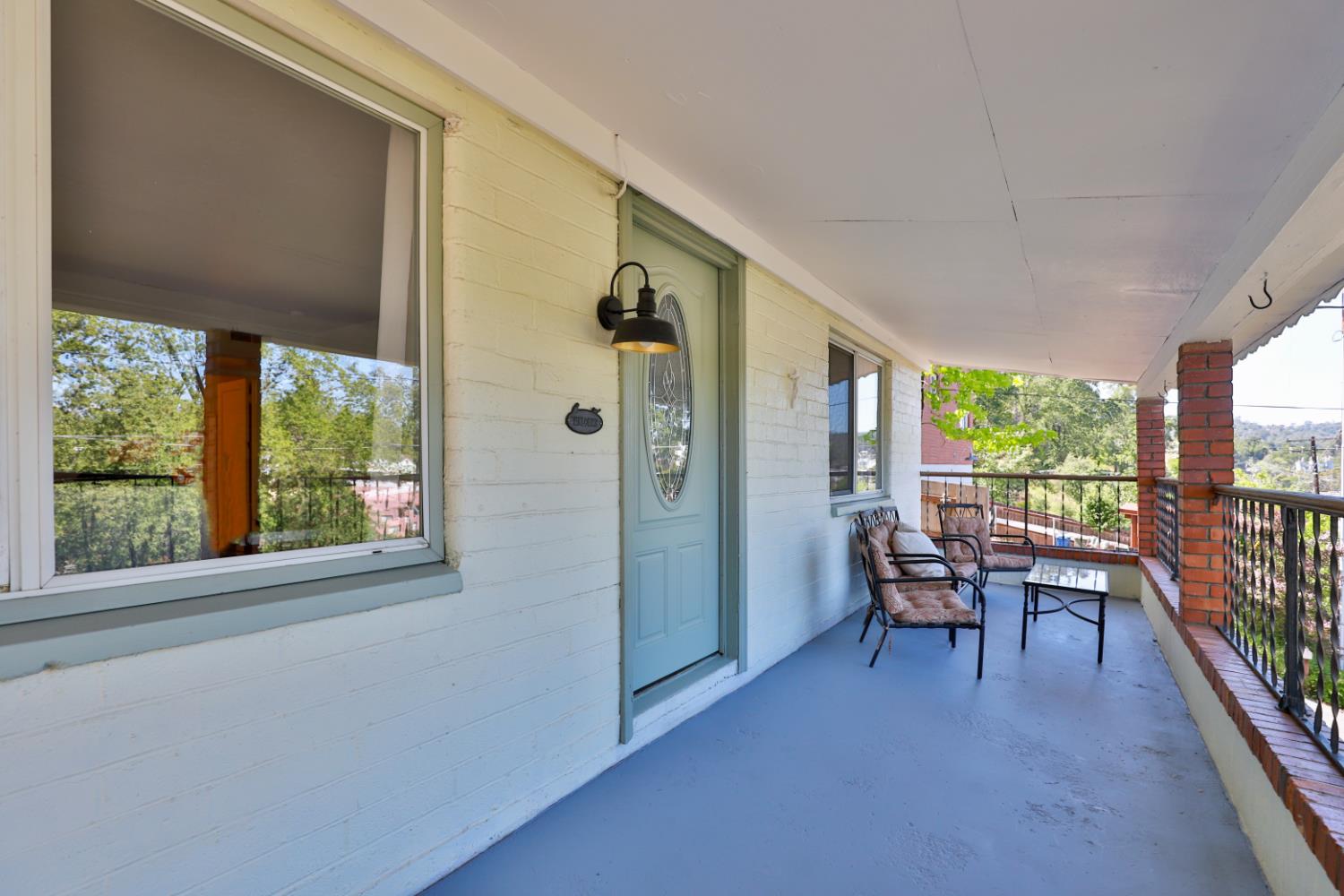 207 Peek Street Jackson, CA 95642 - Photo 26 of 30 a dining room with furniture water view and balcony