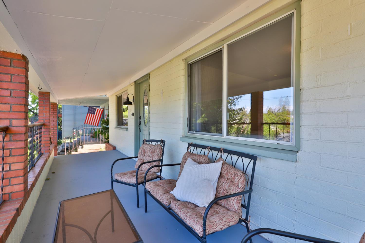 207 Peek Street Jackson, CA 95642 - Photo 27 of 30 a living room with furniture and a window