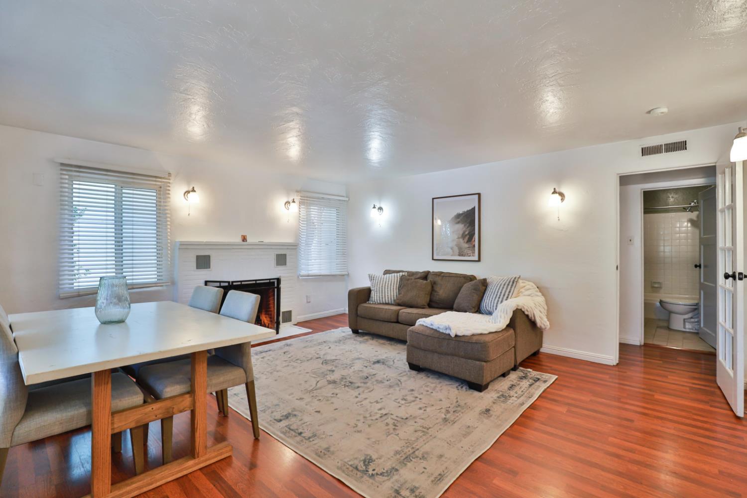 207 Peek Street Jackson, CA 95642 - Photo 6 of 30 a living room with furniture and a wooden floor