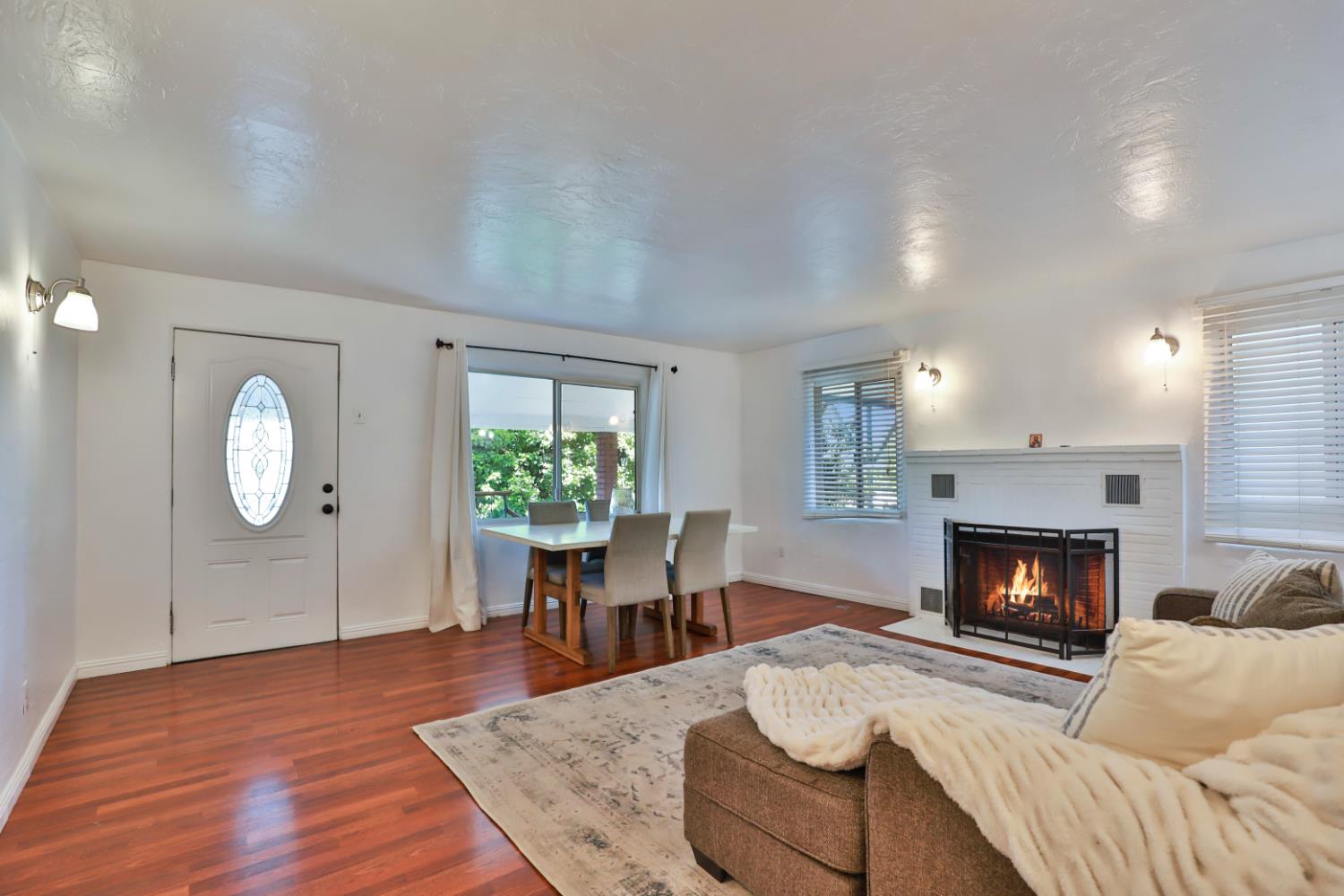 207 Peek Street Jackson, CA 95642 - Photo 8 of 30 a living room with furniture fireplace and window