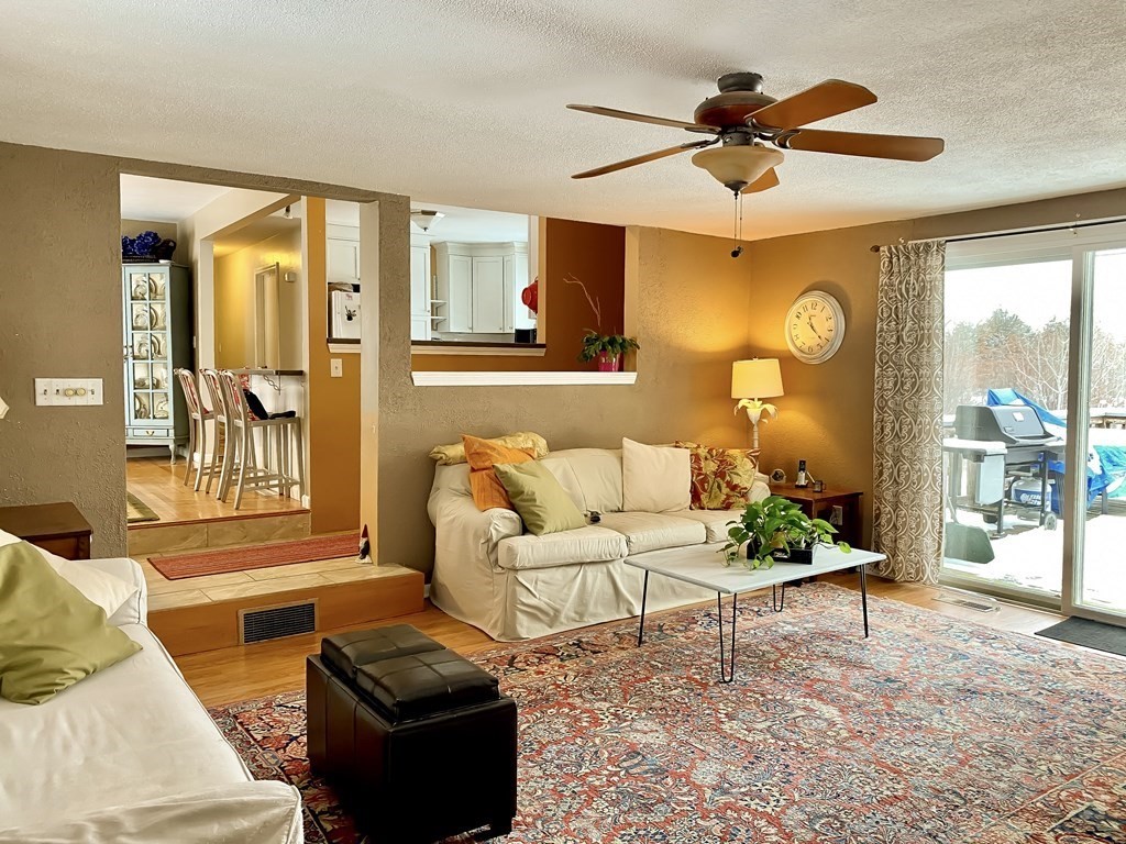 992 Tinkham Road Wilbraham, MA 01095 - Photo 8 of 33 a living room with furniture and a large window