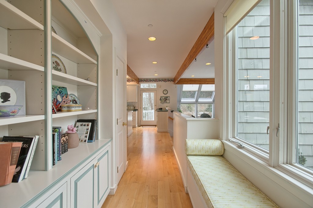 37 Grapevine Road Wenham, MA 01984 - Photo 19 of 30 a view of a hallway with wooden floor and windows