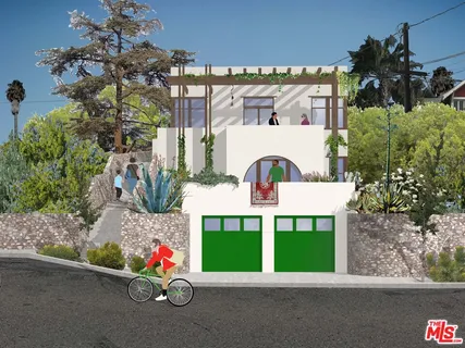 a view of a house with a garden and pathway