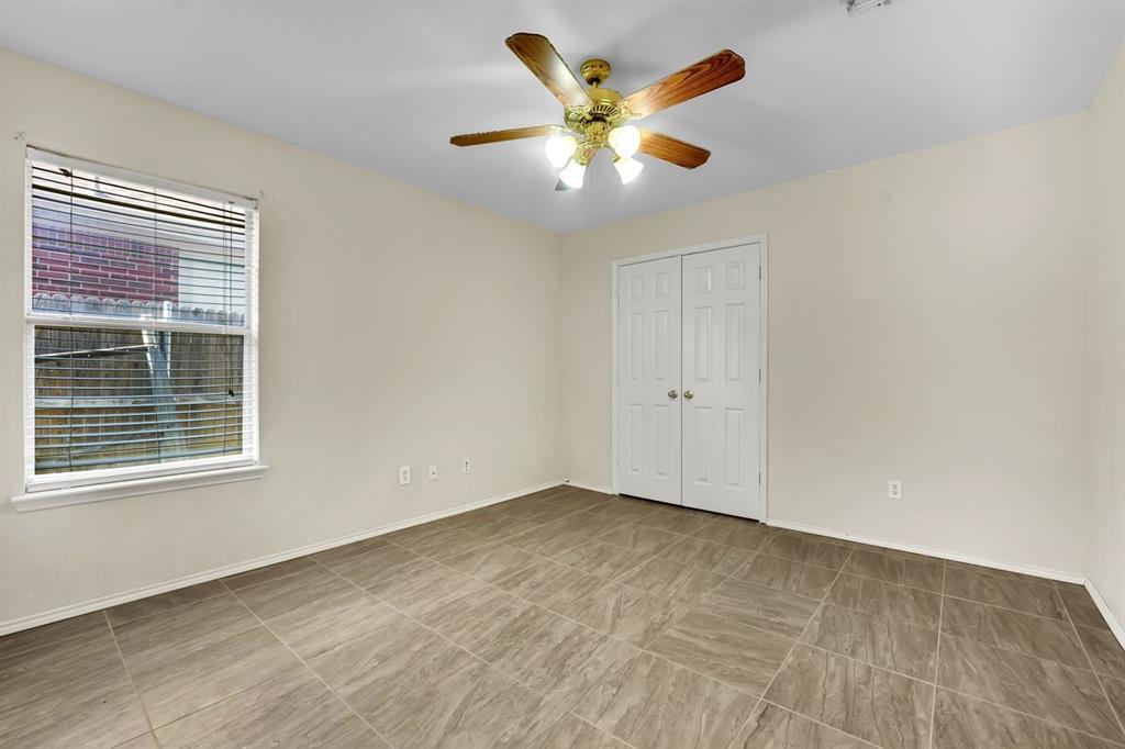 1708 Windcastle Drive Mansfield, TX 76063 - Photo 20 of 28 a view of an empty room with a window