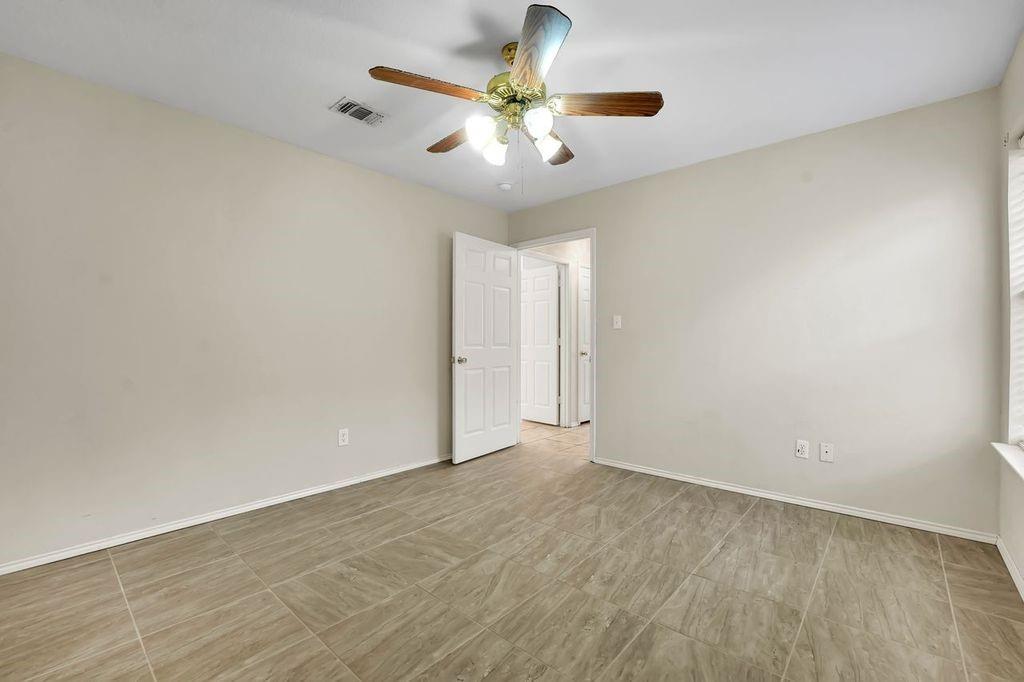 1708 Windcastle Drive Mansfield, TX 76063 - Photo 21 of 28 wooden floor in an empty room
