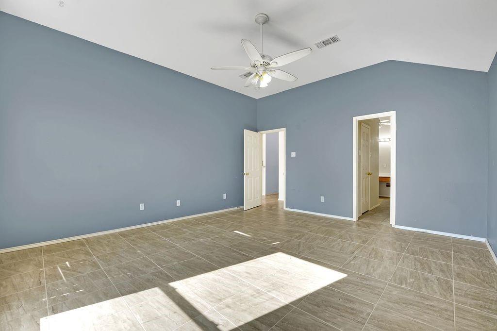 1708 Windcastle Drive Mansfield, TX 76063 - Photo 23 of 28 a view of an empty room with wooden floor