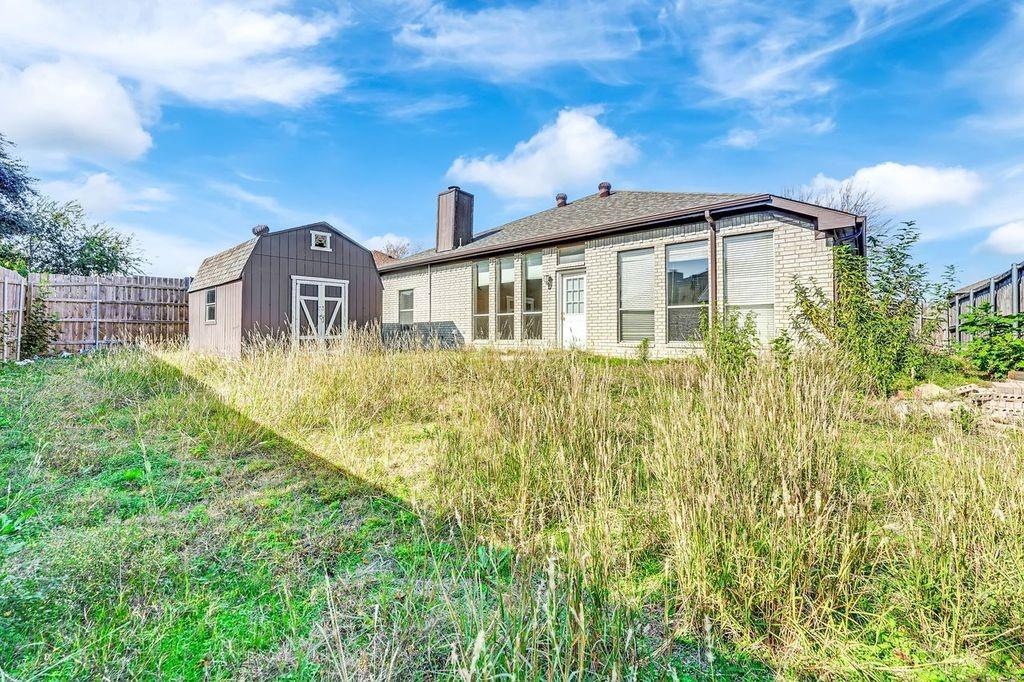 1708 Windcastle Drive Mansfield, TX 76063 - Photo 28 of 28 a front view of a house with a yard