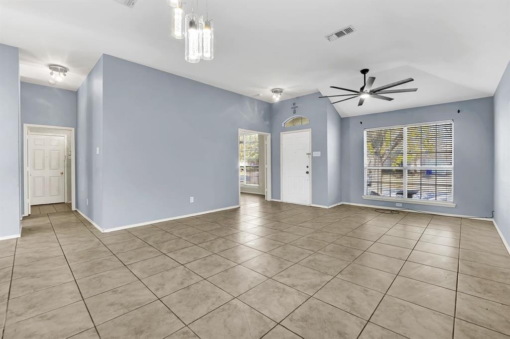 1708 Windcastle Drive Mansfield, TX 76063 - Photo 6 of 28 a view of an empty room with a window