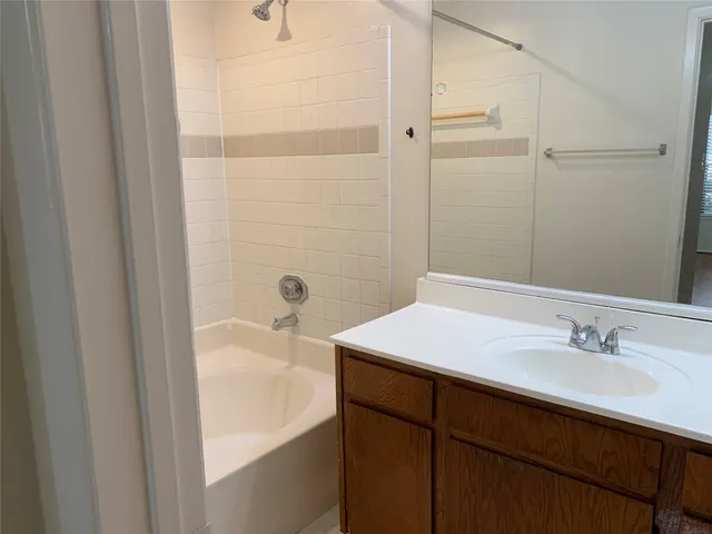 a bathroom with a sink and a bathtub