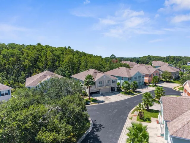 a view of a street with a building in the background