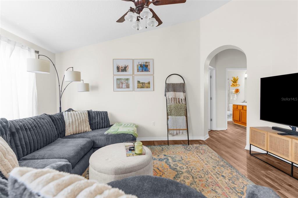 8546 Great Egret Trace New Port Richey, FL 34653 - Photo 8 of 21 a living room with furniture and a flat screen tv