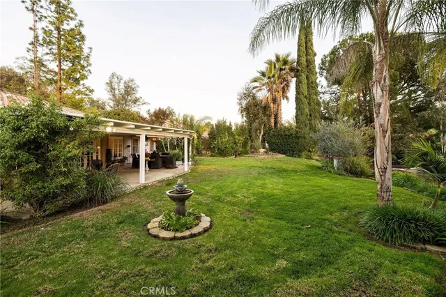 a view of a backyard with a garden