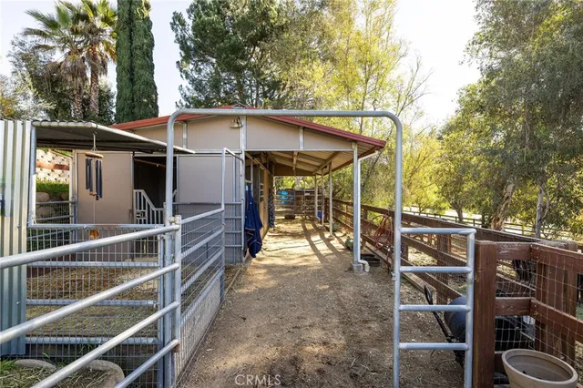 a view of a balcony with chairs and floor
