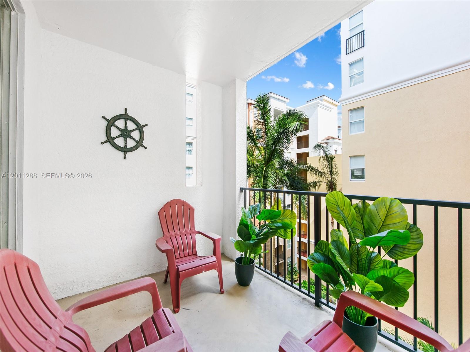 17100 North Bay Road, Unit 1614 Sunny Isles Beach, FL 33160 - Photo 14 of 17 a front view of a house with garden