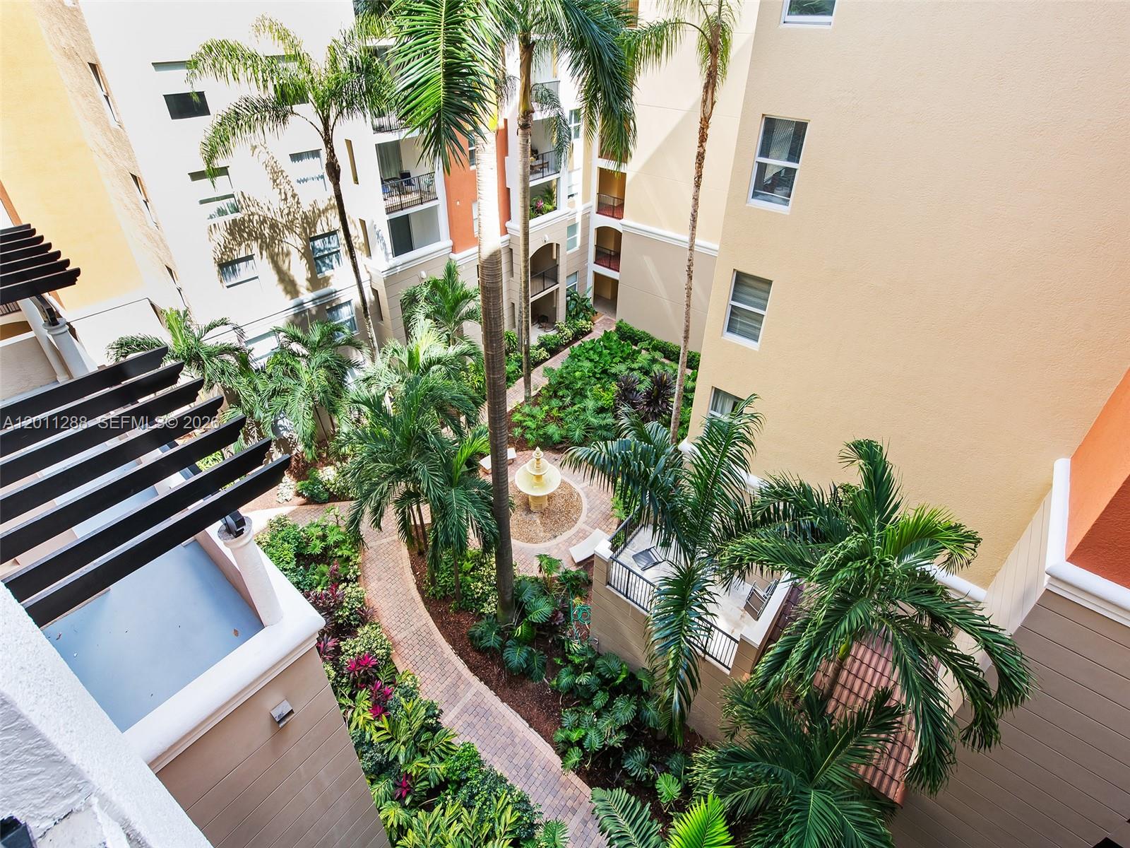 17100 North Bay Road, Unit 1614 Sunny Isles Beach, FL 33160 - Photo 15 of 17 a view of a yard in front of a house