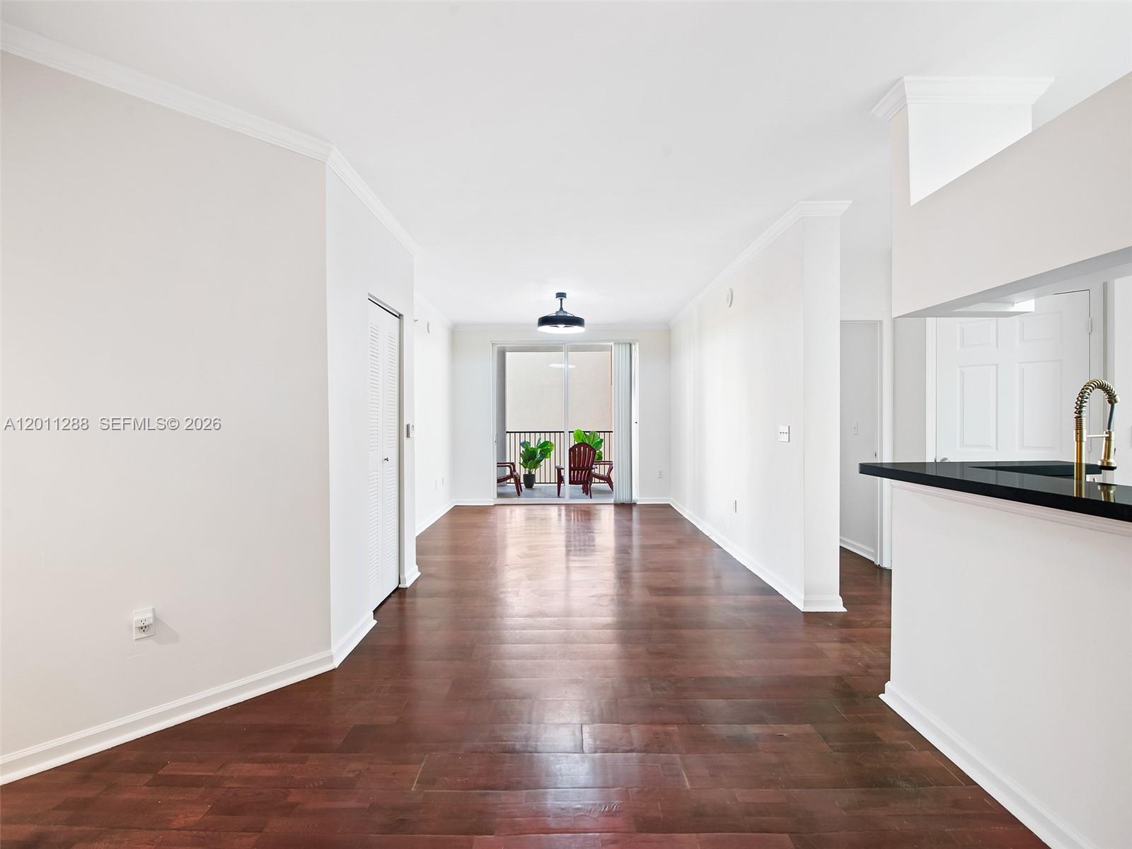 17100 North Bay Road, Unit 1614 Sunny Isles Beach, FL 33160 - Photo 3 of 17 a view of empty room with wooden floor