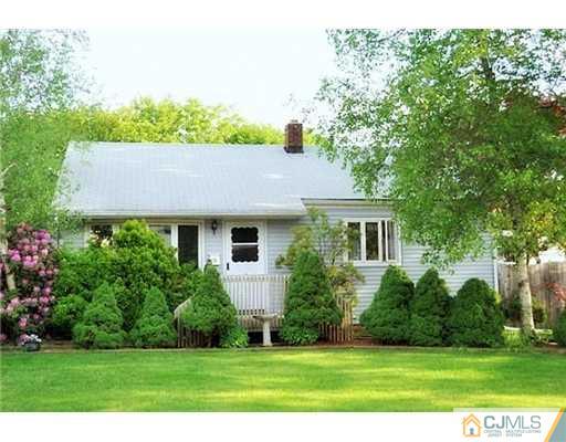 9 Cannon Road East Brunswick, NJ 08816 - Photo 1 of 7 a view of a house with a yard