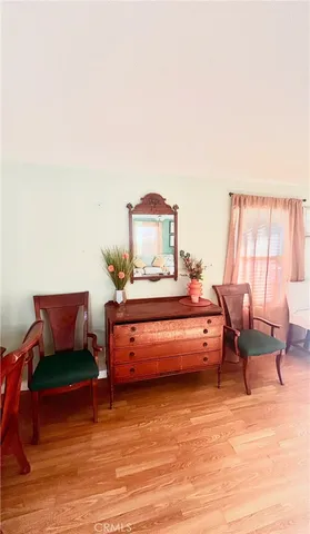 a spacious bedroom with a bed and a couch