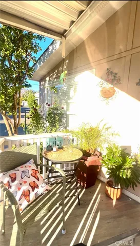 a view of a balcony with an outdoor space