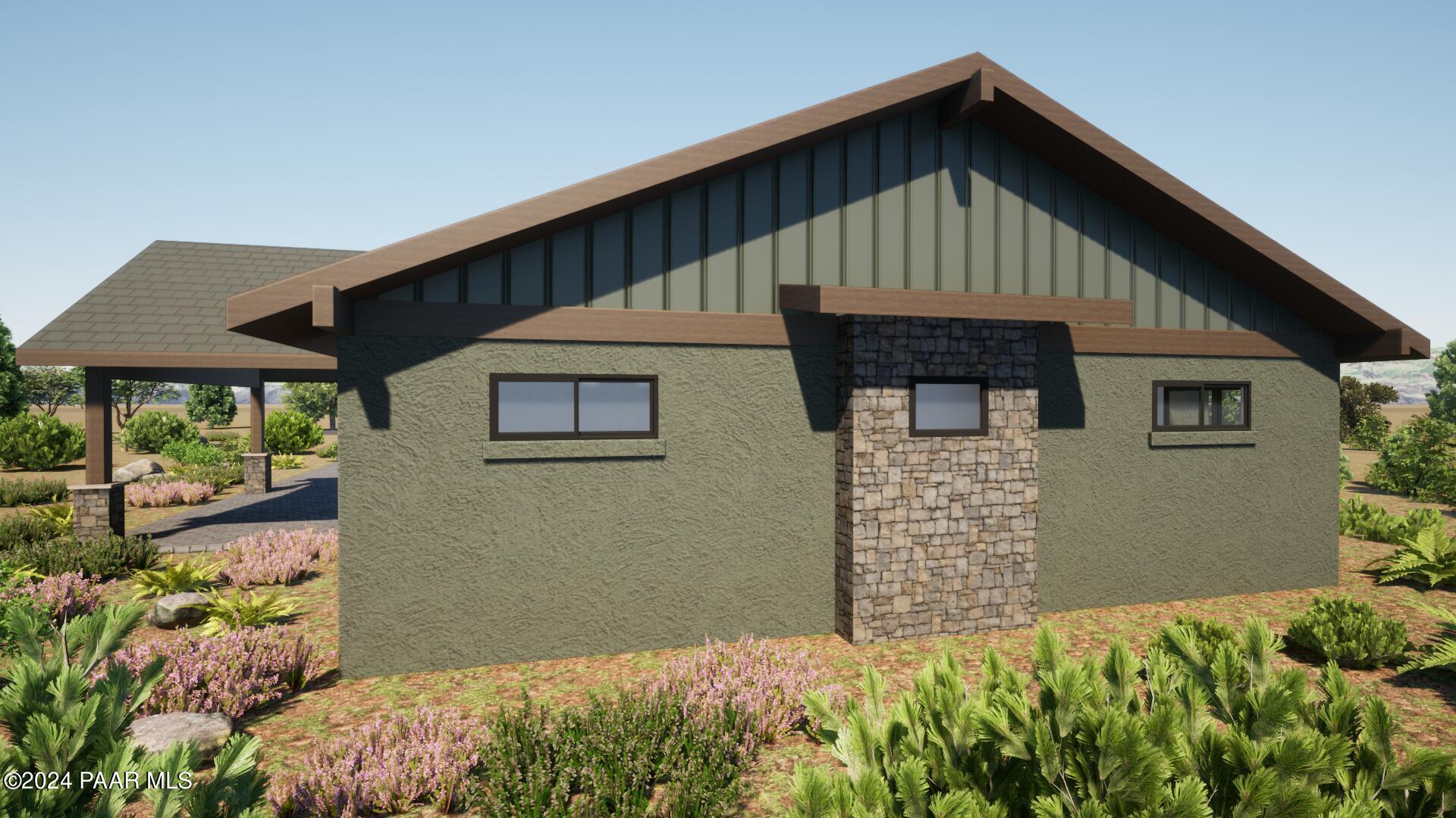 12905 Dyna Circle Prescott, AZ 86305 - Photo 2 of 18 a front view of a house with a garden