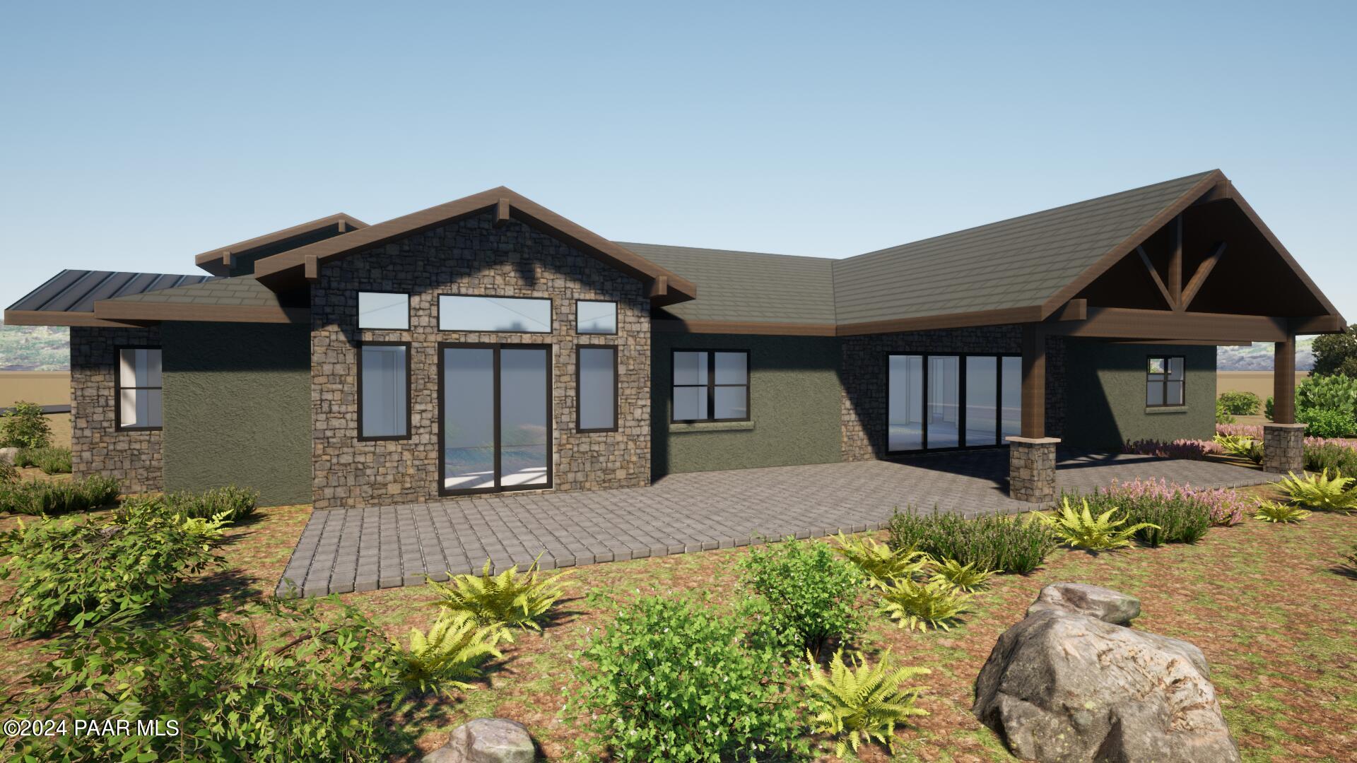 12905 Dyna Circle Prescott, AZ 86305 - Photo 3 of 18 a front view of a house with garden