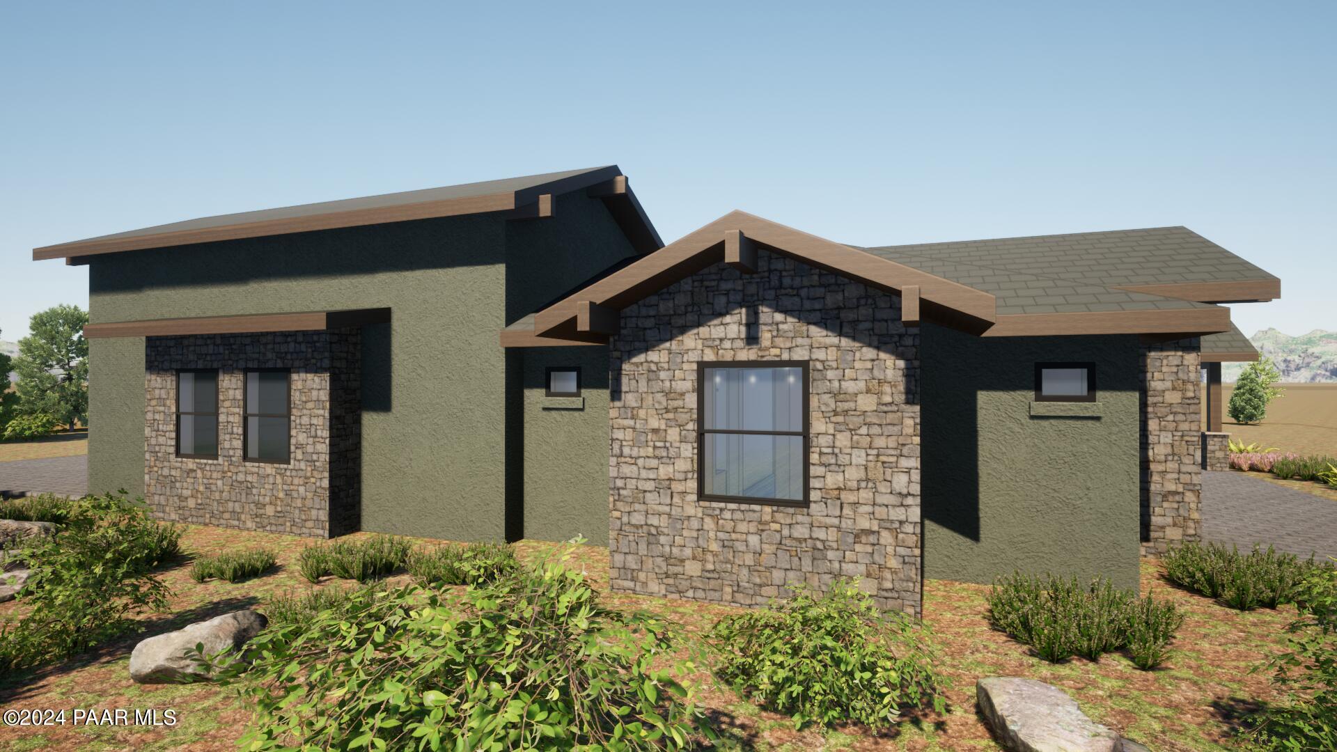 12905 Dyna Circle Prescott, AZ 86305 - Photo 4 of 18 a front view of a house with a yard