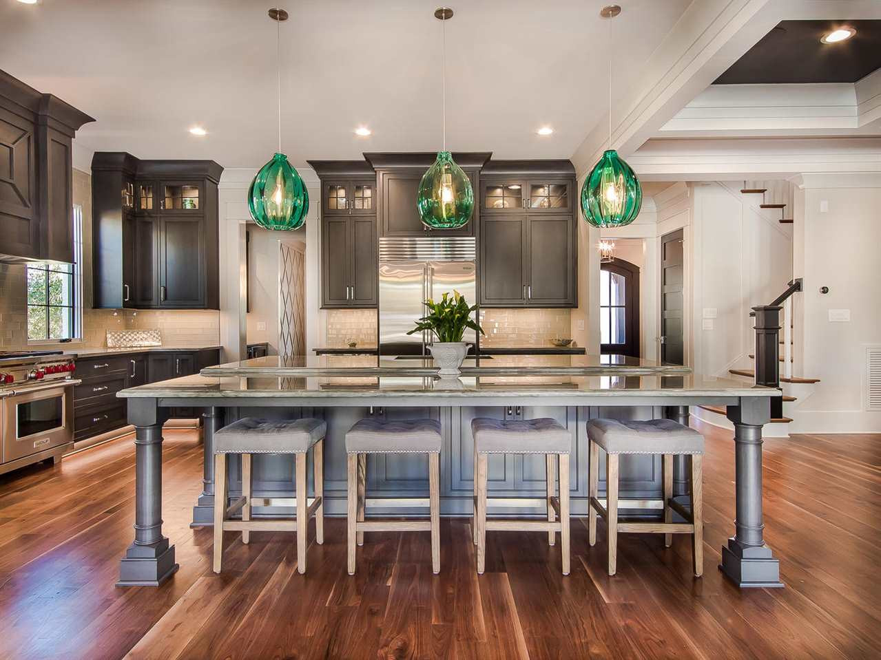 3210 Cobblestone Court Raleigh, NC 27607 - Photo 7 of 23 Extra Large Counter Top provides plenty of room for bar stools/ entertaining large parties. Exquisite Kitchen with Wolfe Range and Sub Zero Refrigerator