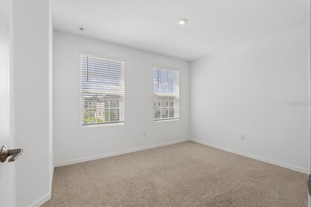 6338 Fairmont Lane Palmetto, FL 34221 - Photo 22 of 39 an empty room with a window