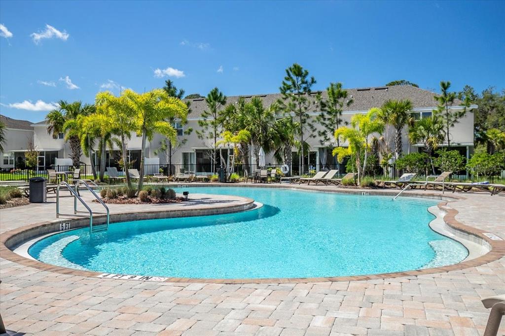 6338 Fairmont Lane Palmetto, FL 34221 - Photo 29 of 39 a view of a swimming pool with outdoor seating