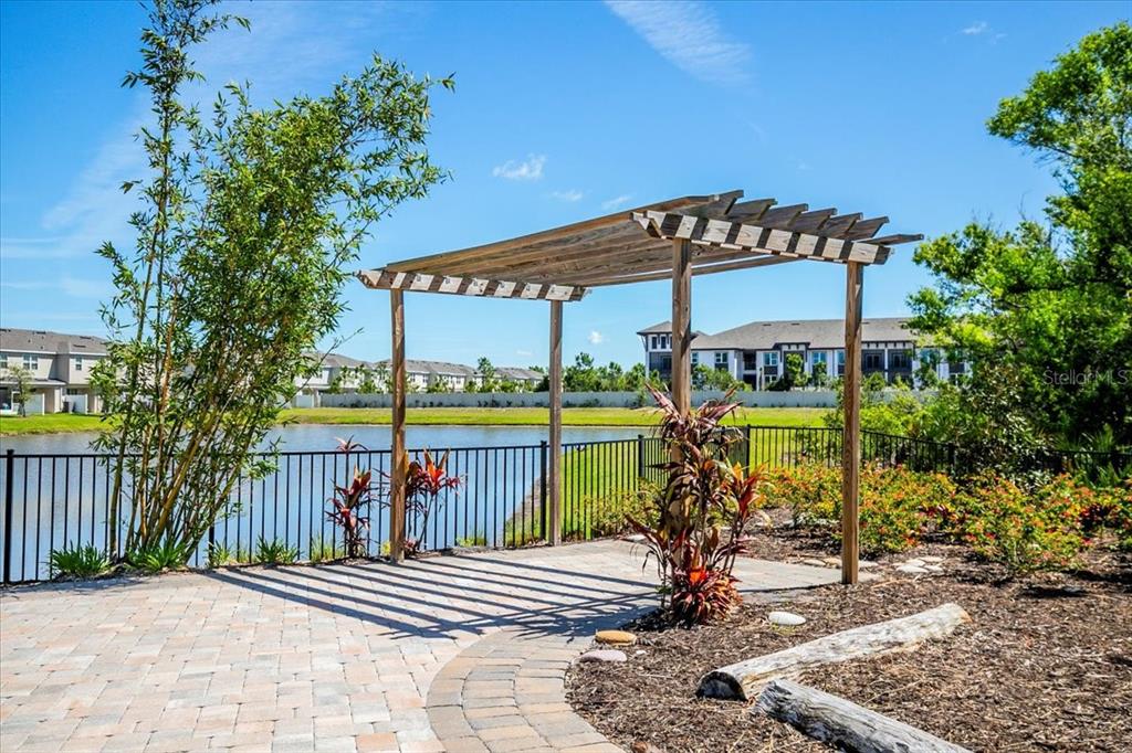 6338 Fairmont Lane Palmetto, FL 34221 - Photo 34 of 39 a view of a chairs and table in the patio