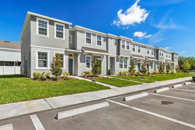front view of a house with a yard