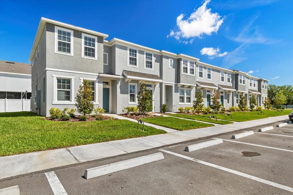 6338 Fairmont Lane Palmetto, FL 34221 - Photo 4 of 39 front view of a house with a yard