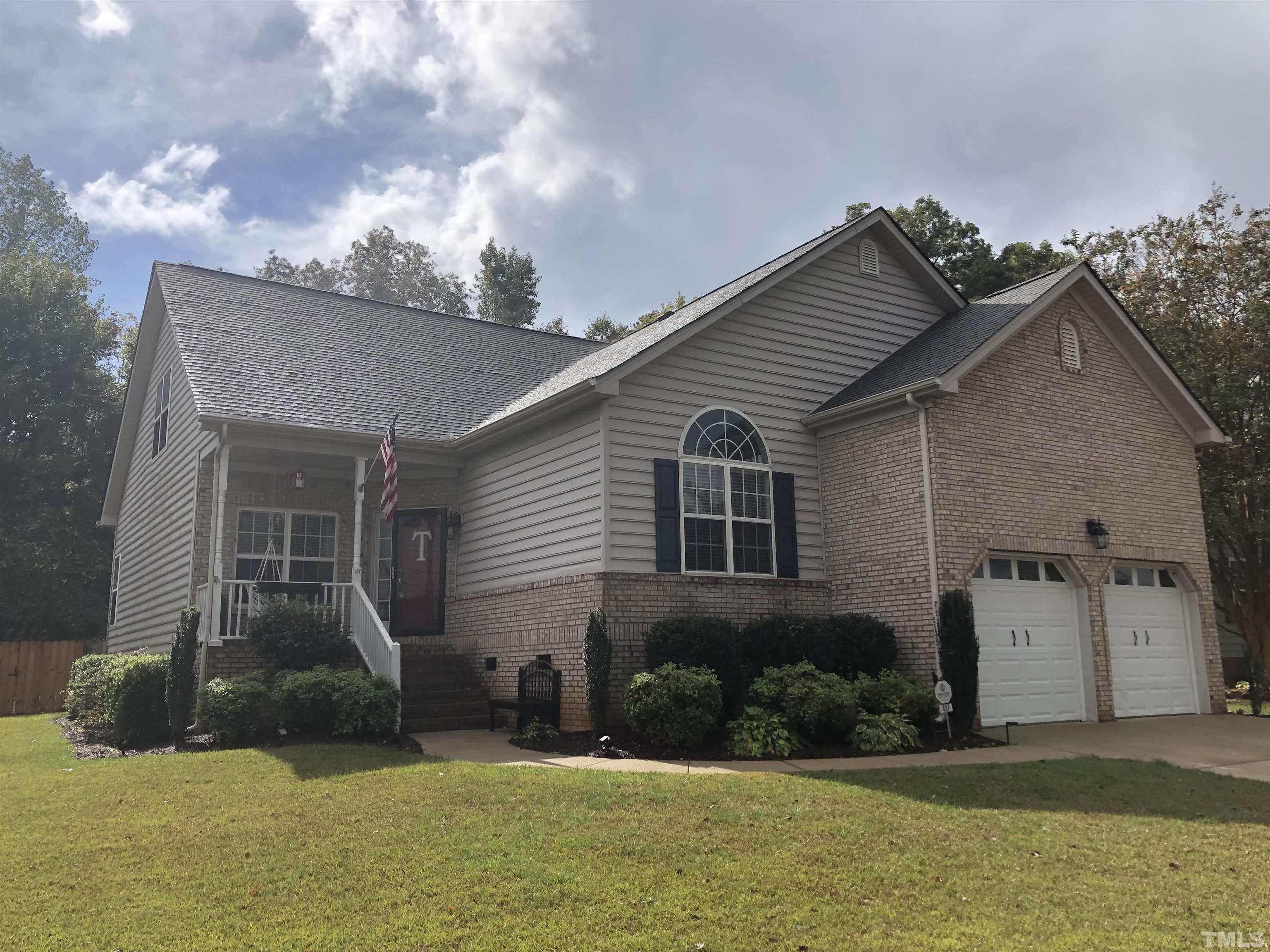 437 Seastone Street Raleigh, NC 27603 - Photo 1 of 30 a front view of a house with a yard