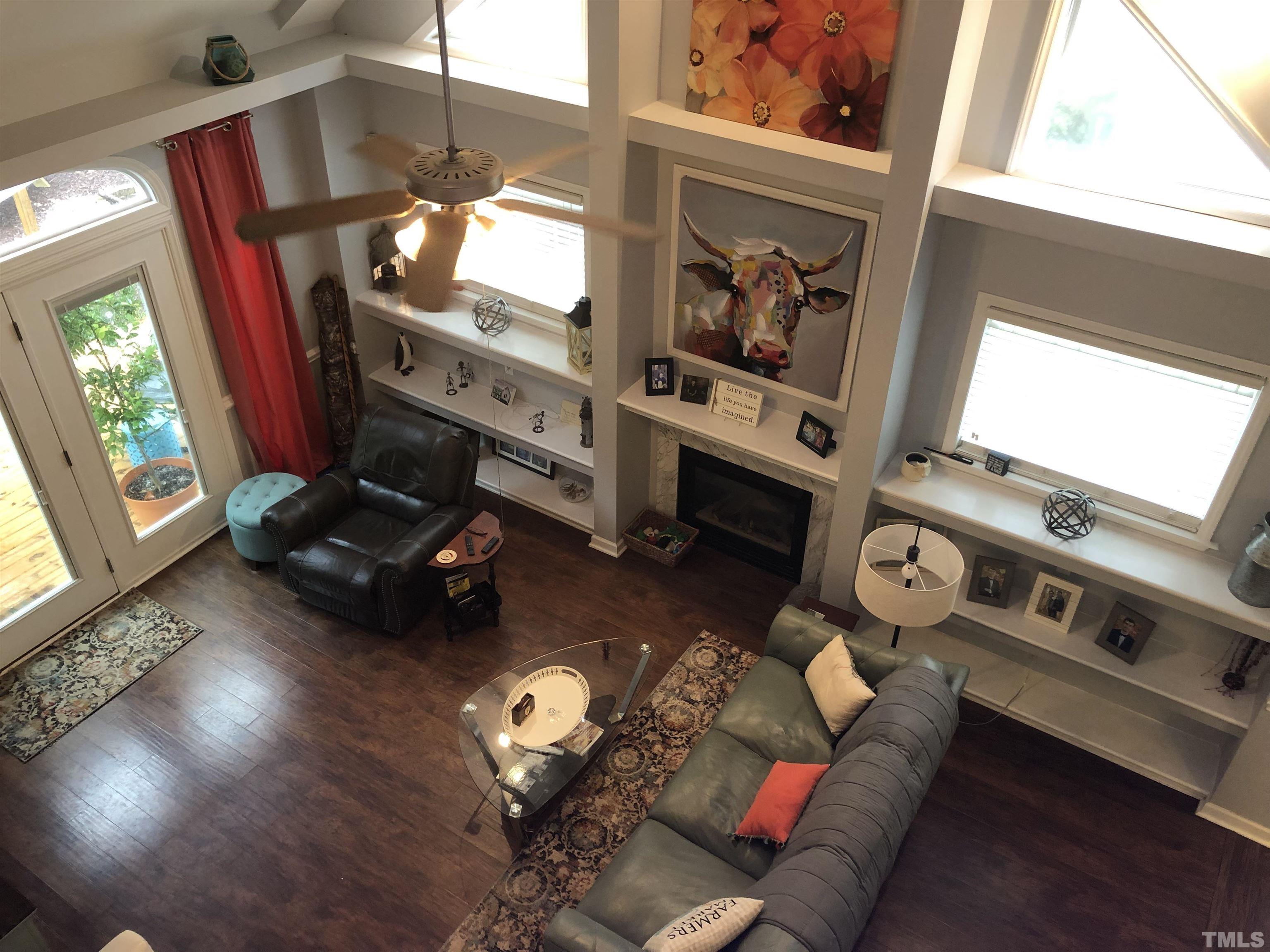 437 Seastone Street Raleigh, NC 27603 - Photo 13 of 30 a living room with furniture and a window