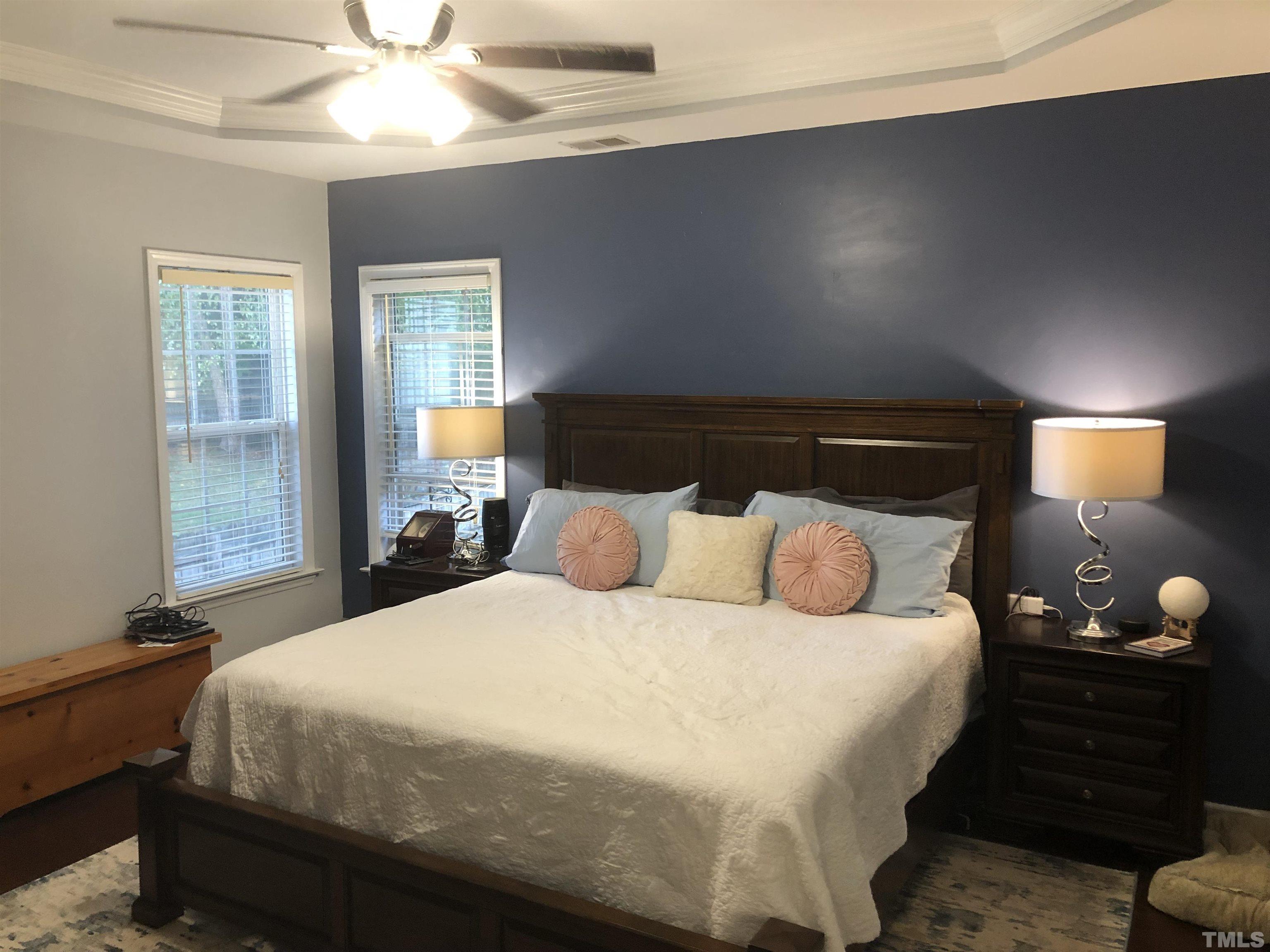 437 Seastone Street Raleigh, NC 27603 - Photo 14 of 30 a bedroom with a bed and a window