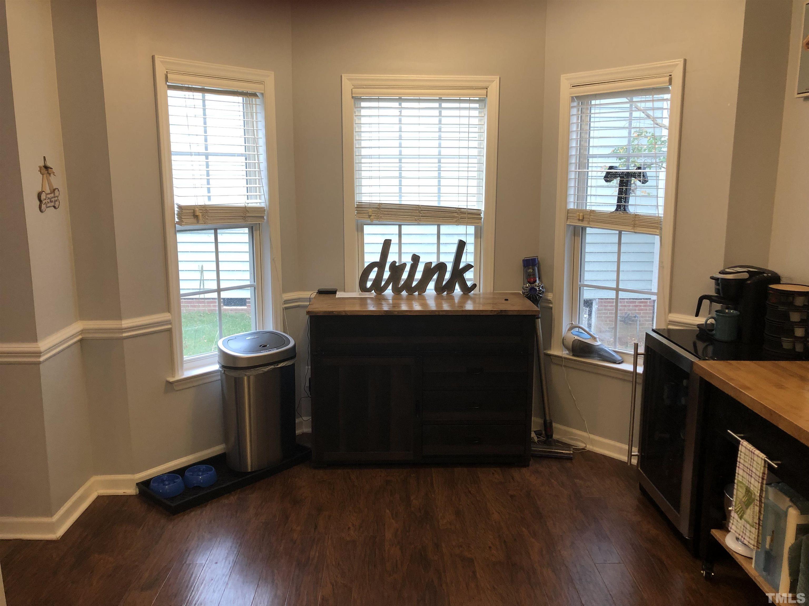 437 Seastone Street Raleigh, NC 27603 - Photo 8 of 30 a kitchen with sink and window