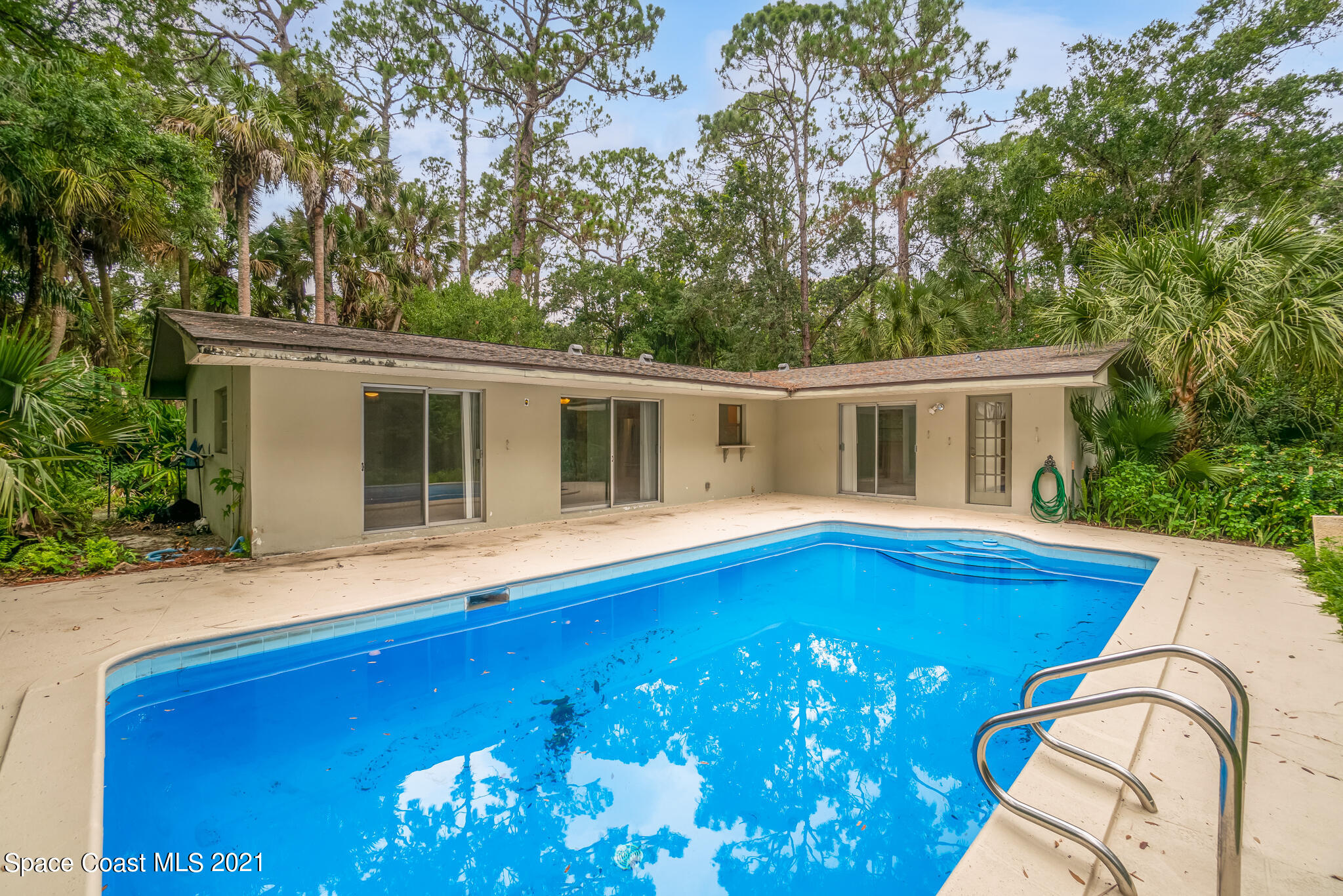 6686 Flamingo Road Melbourne Village, FL 32904 - Photo 2 of 30 a view of a house with a backyard