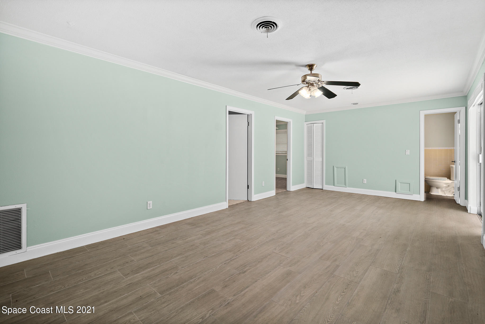 6686 Flamingo Road Melbourne Village, FL 32904 - Photo 11 of 30 a view of empty room with ceiling fan