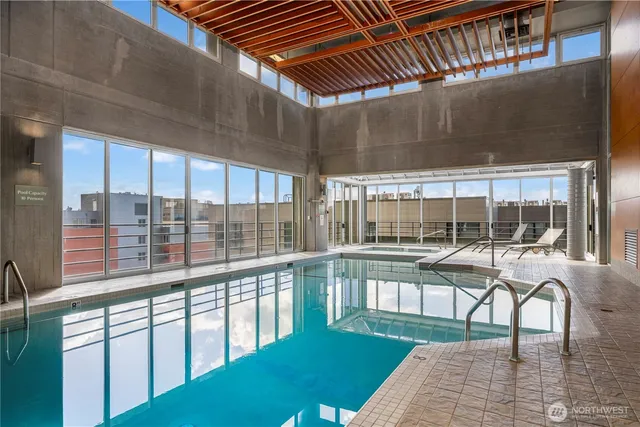 a house view with pool table and chairs