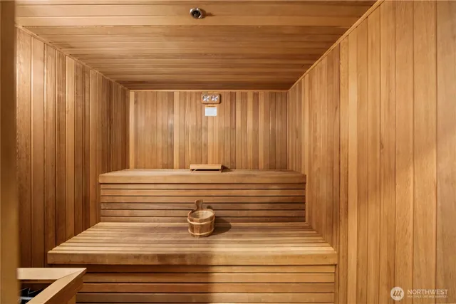 a room with gym equipment and windows